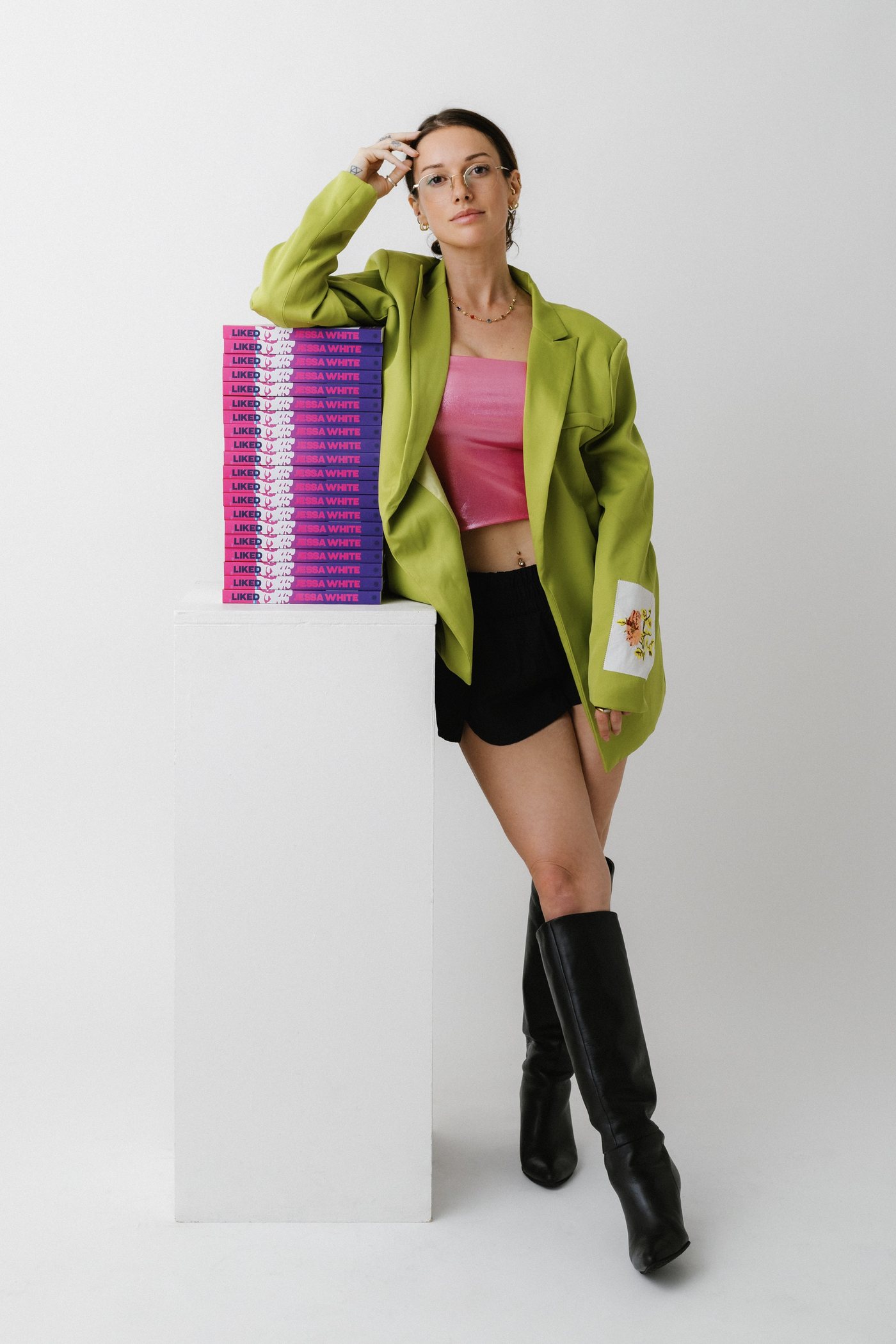 Jessa White with a stack of Liked