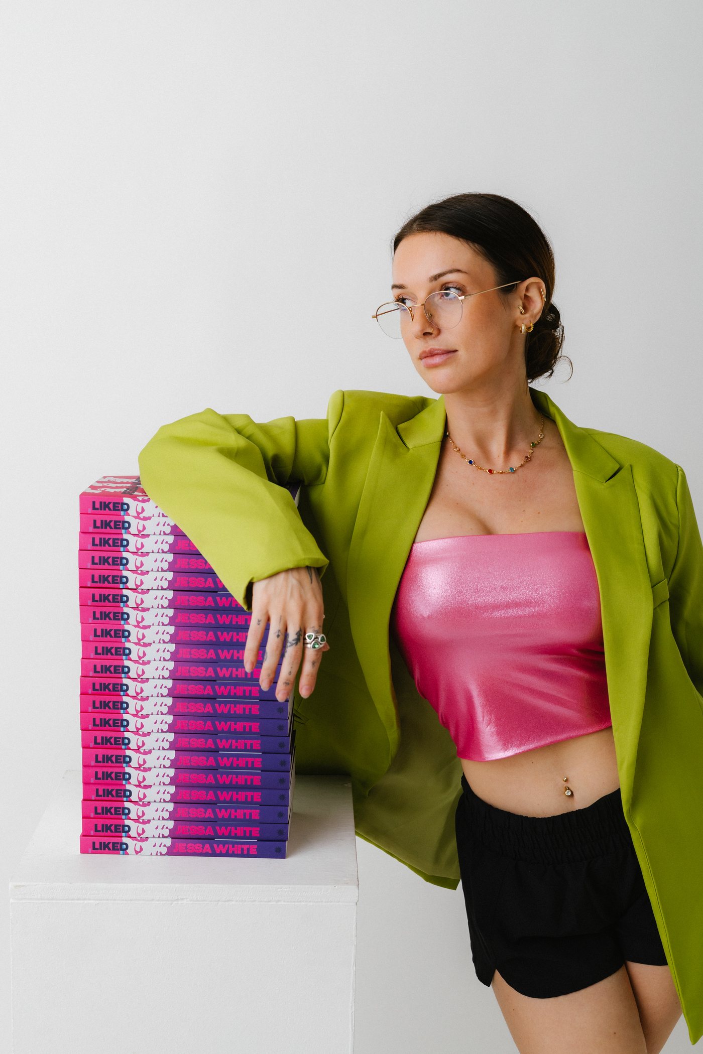Jessa White, leaning on the books